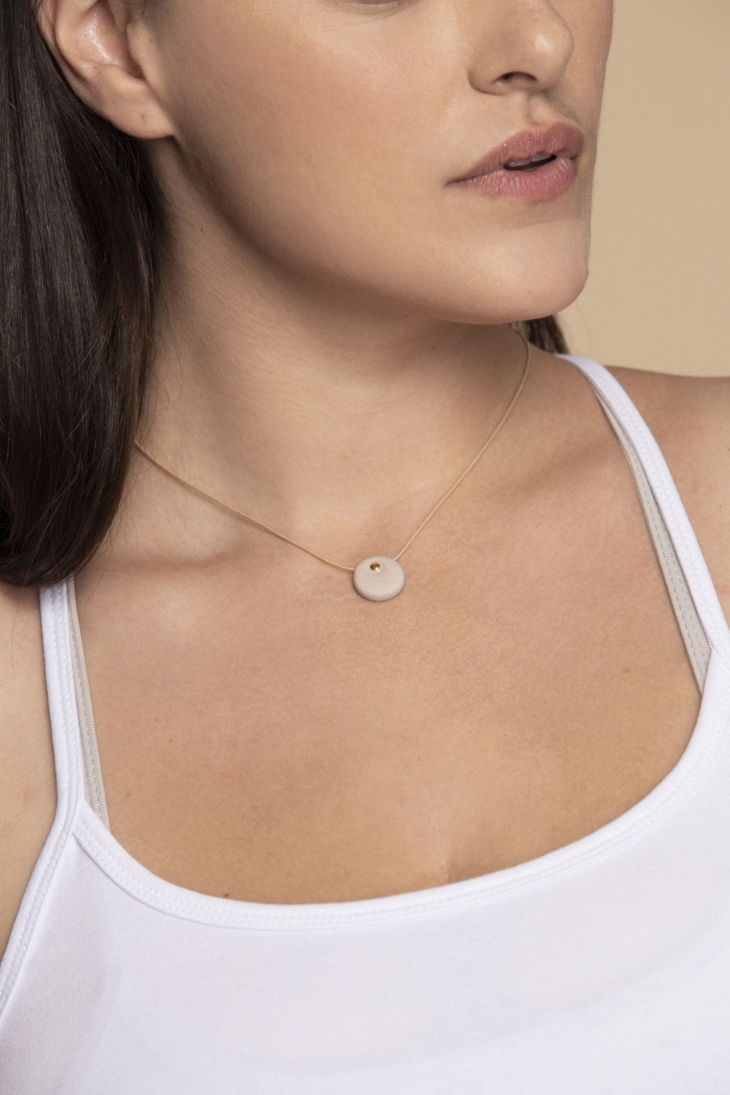 The Ripple Circle Necklace womens clothing Ripple Yoga Wear Nude clay with a 24K gold circle 