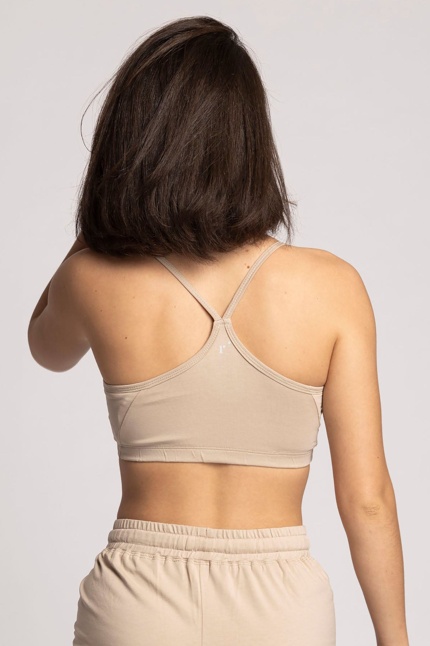 https://rippleyogawear.com/cdn/shop/files/almond-organic-cotton-criss-cross-bra-womens-clothing-ripple-yoga-wear-720708_fdc846db-edf3-45a6-a74c-d36776ac40e0.jpg?v=1691405712
